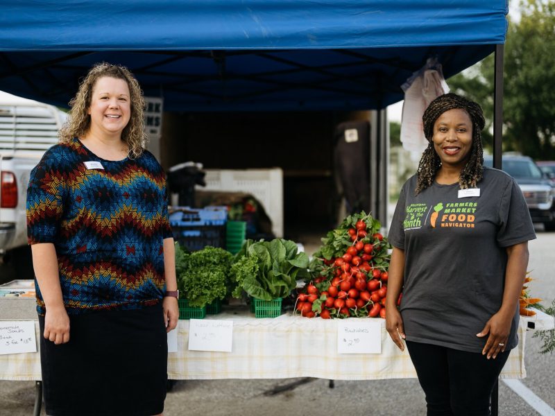 HFHS Farmers Market Food Navigators Amanda Krieg and Emma Shepherd at the Mt. Clemens Farmers Market.