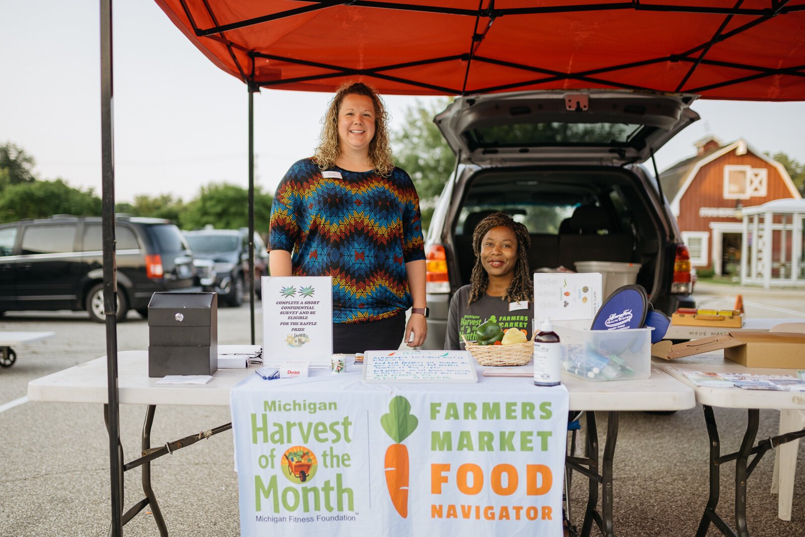 HFHS Farmers Market Food Navigators Amanda Krieg and Emma Shepherd at the Mt. Clemens Farmers Market.