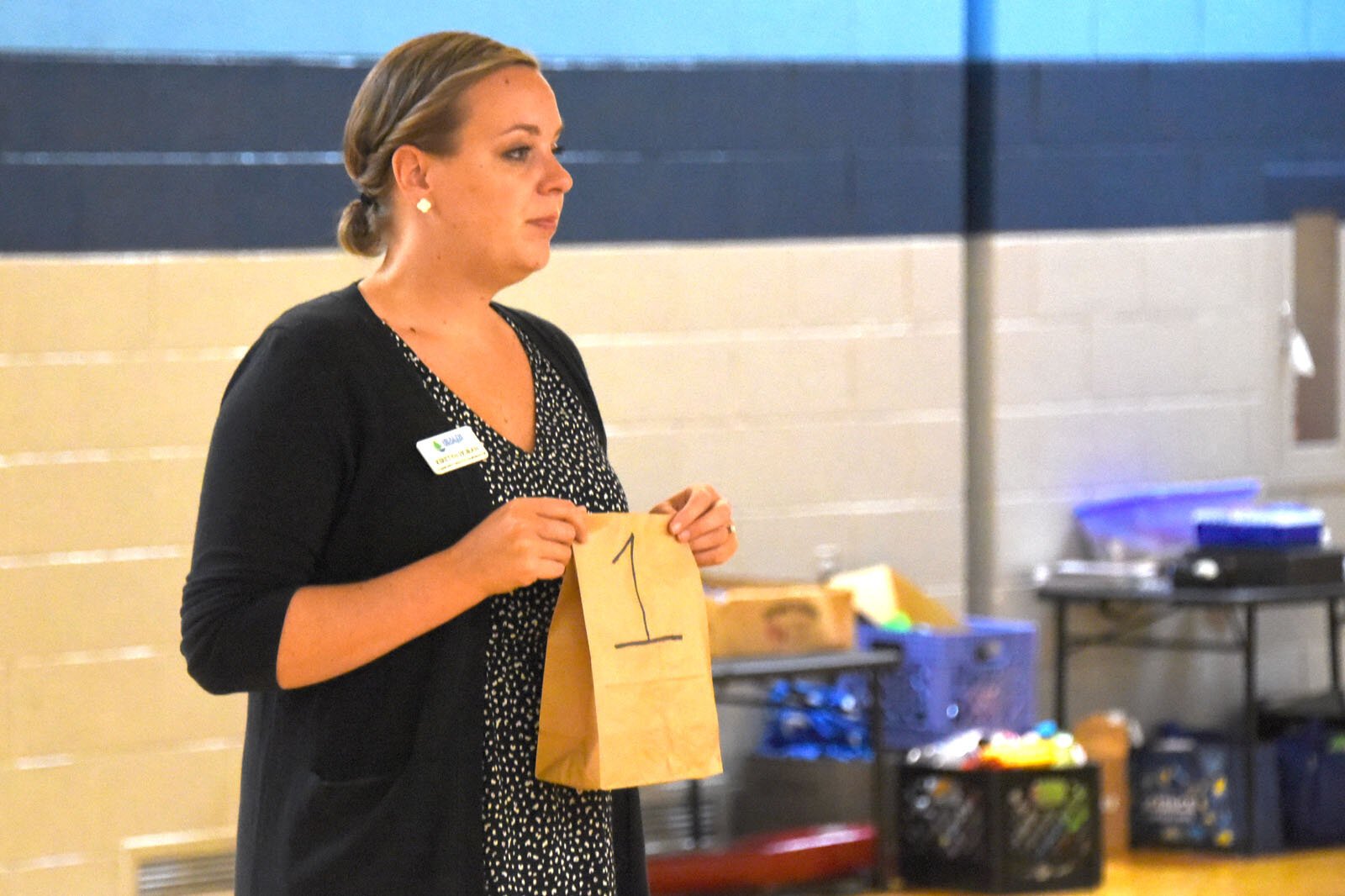 Health Department of Northwest Michigan Community Health Coordinator Kirstyn Horan speaks to children at the YMCA summer day camp at Petoskey's Ottawa Elementary School.