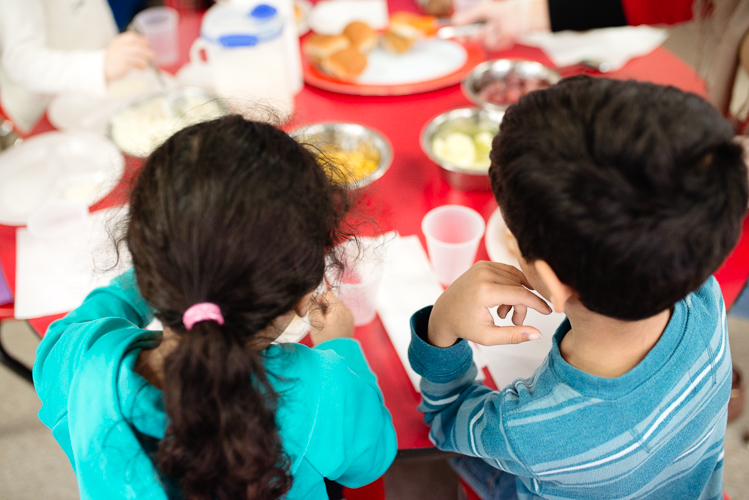 Hand-on learning helps children share with their families a love for good food.