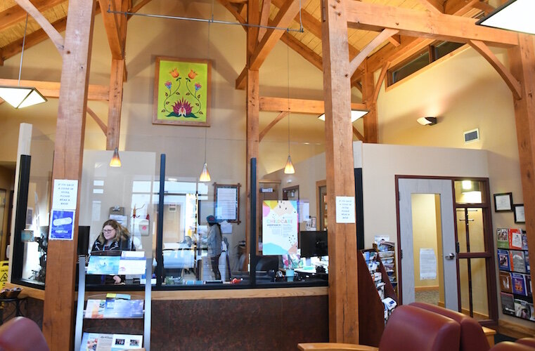 At the front desk of the health and fitness center. Money generated by the casino enabled the tribe to build 33 homes, a health and fitness center, a store, and tribal offices on the Reservation, specifically for tribal members.