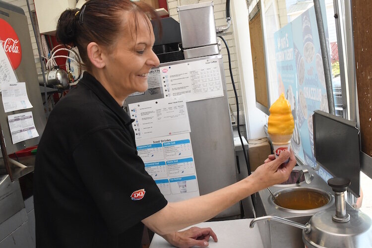 No. 5 Anita Snell makes a dipped cone.
