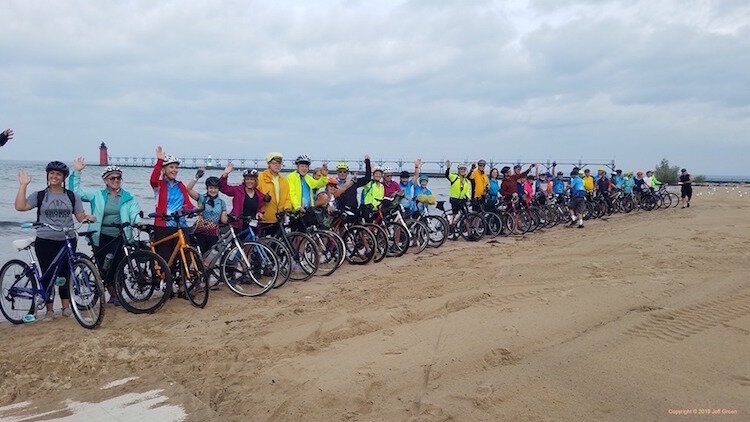 No. 4 Kalamazoo River Valley Trail officially now part of the Great Lake-to-Lake Trails. Riders dip their rear tire in Lake Michigan before taking off for Lake Huron. 