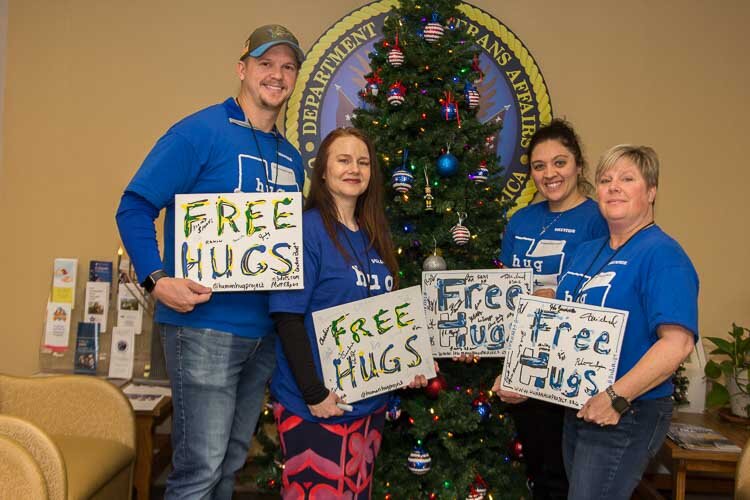 Hug Ambassador Program volunteers, from left, Jeremy Morris, Aurora Zortman, Brittany Gervais and Amy Vought.