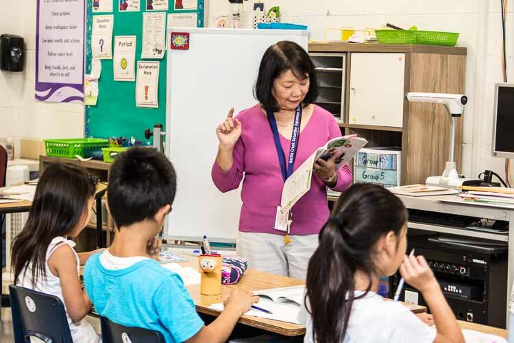 Third grade teacher Jinko Oyake teaching class.