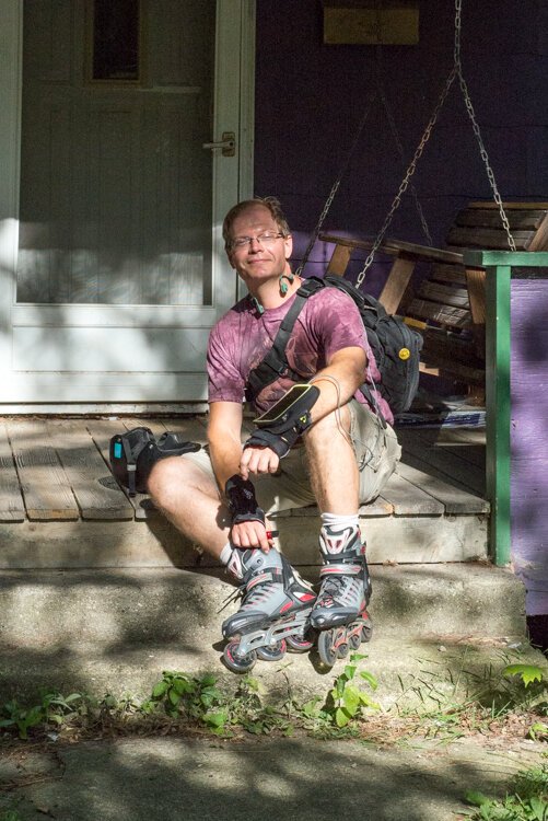 A Vine resident relaxes after rollerblading.