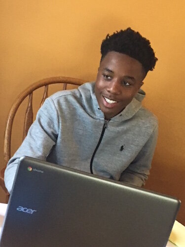 Community Correspondent Jermaine McClellan works on a story for the On the Ground Community Correspondents Academy.