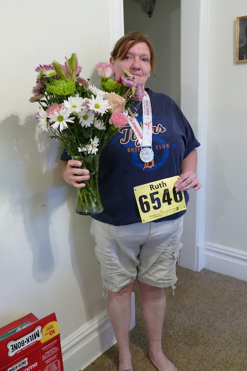 Ruth Decker and her flowers after she participated in the Borgess Run For The Health Of It