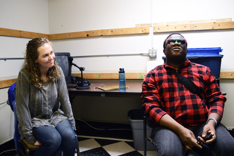 Abby Tongue, grad student at WMU’s Department of Blindness and Low Vision Studies, and fiancé Osman Karoma, testing audio description service for Kalamazoo Civic Theatre. Photo by Mark Wedel