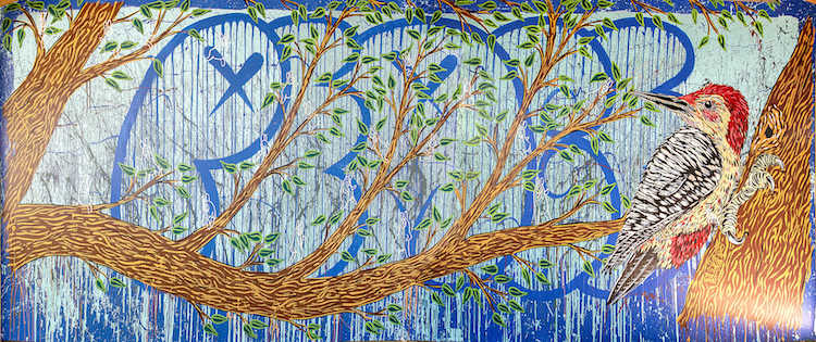 Kalamazoo artist Patrick Herschberger created this mural, located near the play structures and gardens, during a Peace House summer program. Photo by Nicholas Zastrow