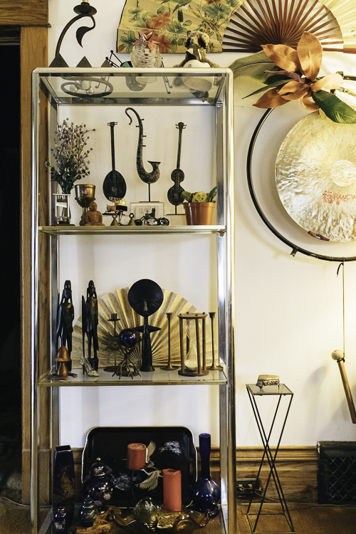 Props from over 200 shows and 45 productions, including this gong from "The King and I," decorate CJ Drenth’s home.