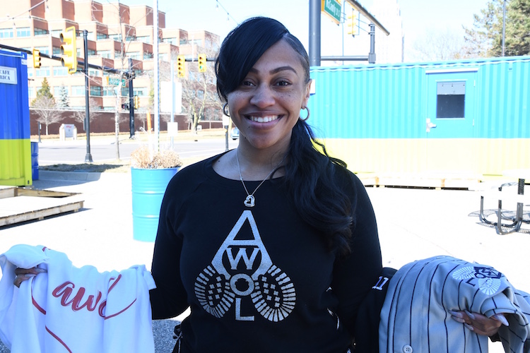 Shannon Patrick shows some of her clothing brand.