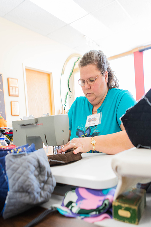Handmade items such as baby buntings, mittens, hats and afghans sold in the gift shop the made by volunteers augment the work work of two full-time and 10 part-time employees.