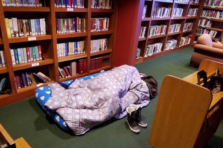 Some homeless find a quiet place for a nap during the brutal cold snap.