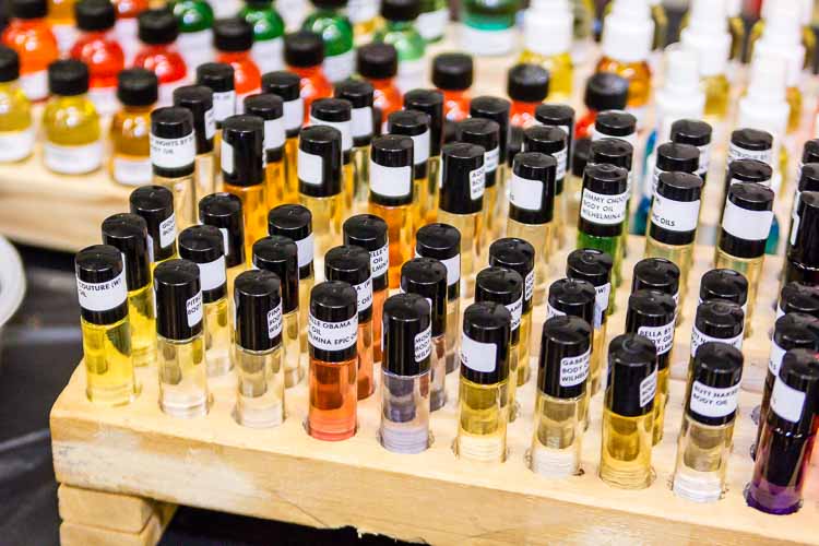 A vendor displayed products, including shea butter and scented oils, at the Northside Art Hop.