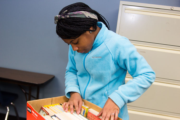 Youngsters enjoy their books in this after-school program.