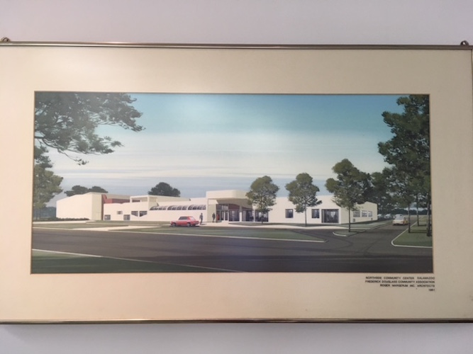 This artist's rendering of the present Douglass Community Association building hangs in Sid Ellis' office.