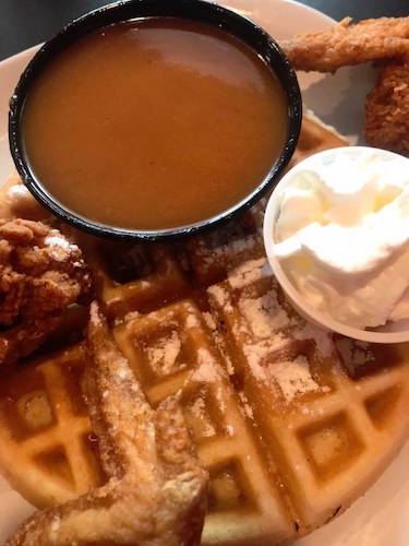 Peaches and Cream Waffles at Cookie's Five Star Grill features is made from scratch, down to the whipped cream.