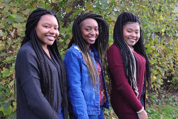 Ken'Aujune, Ke'Asia, and Ke'Aujanaa. Caring for Ke'Aujanaa, 16, who has sickle cell anemia, during a crisis takes the whole family's help. Photo by Vicky Kettner