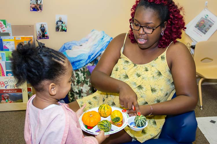 Aerin Caldwell, assistant teacher, works with students in the Northside Preschools, an innovative collaboration, which started in 2014. Photo by Susan Andress
