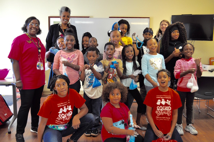 JABS Slime Club members hold up their slimes, none of which are exactly alike. Photo by Vicky Kettner