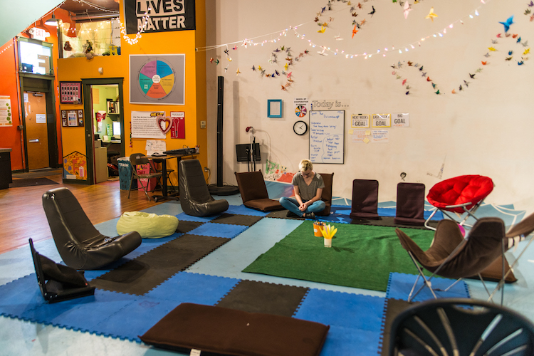 Executive Director Allison Kennedy in the circle at Fire. Photo by Fran Dwight