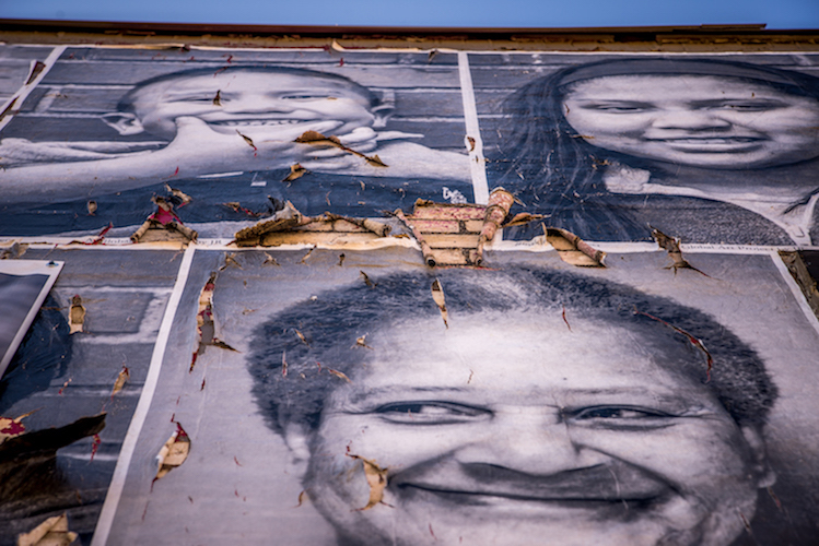 The "Inside Out Project: We Are Edison" is weathered now, but the smiles still are there. Photo by Fran Dwight.