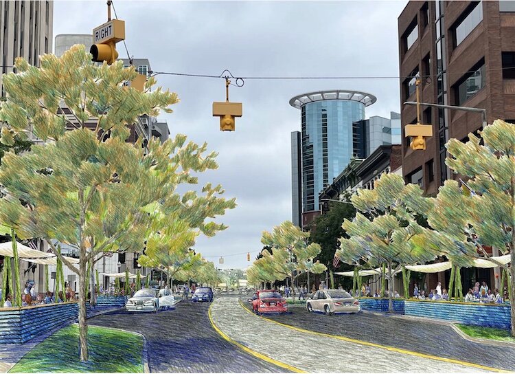 Trees, outdoor dining, calmed traffic on a two-way Michigan Avenue. A possible scene from Downtown Kalamazoo, ten years from now? From the Notre Dame charrette study, Downtown Kalamazoo, A Study of Urban Sequences and Activation of the Public Realm