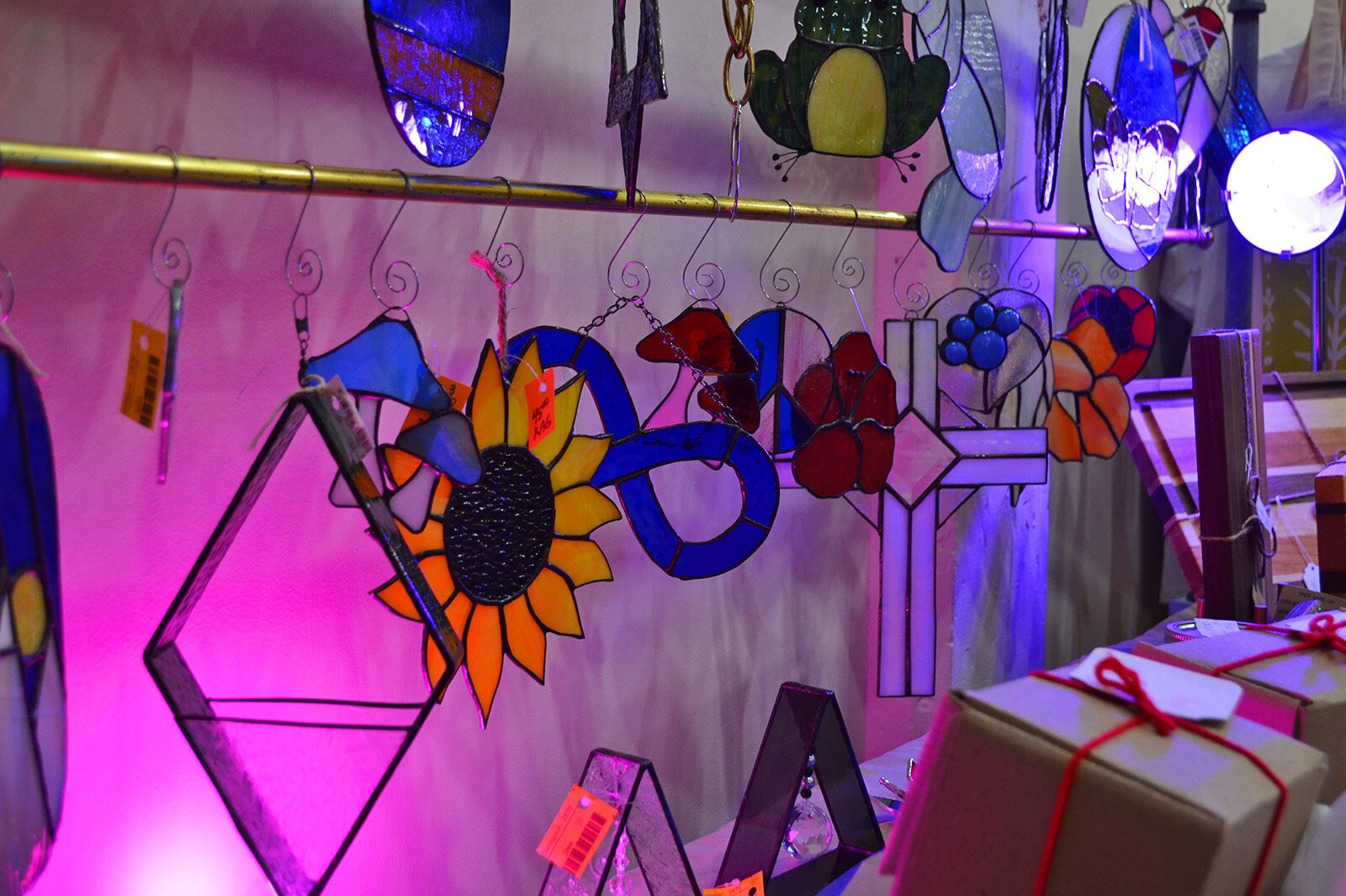 All through the studio stained glass pieces from Kalamazoo Art Glass reflected the holiday lights hung from the rafters in the space.