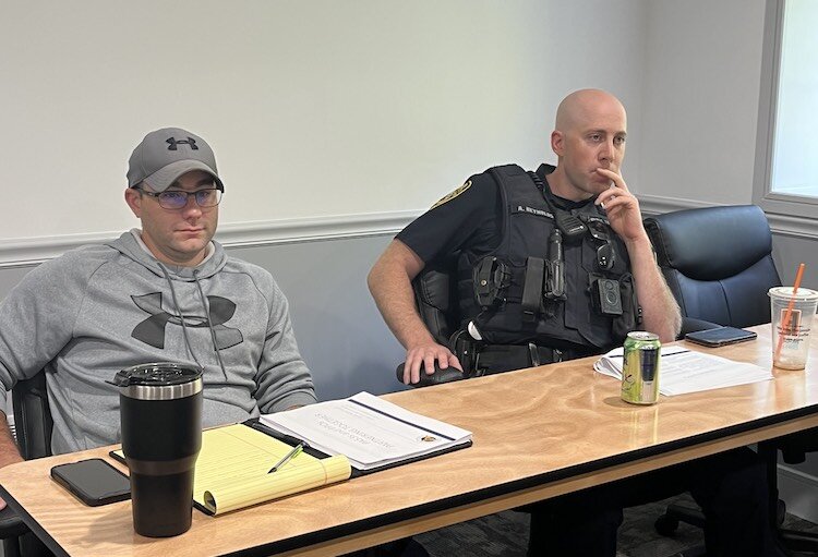Officer Dan Riley at right and a fellow officer at left.