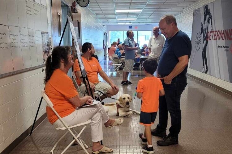 Attendees learn about the disability civil rights movement.