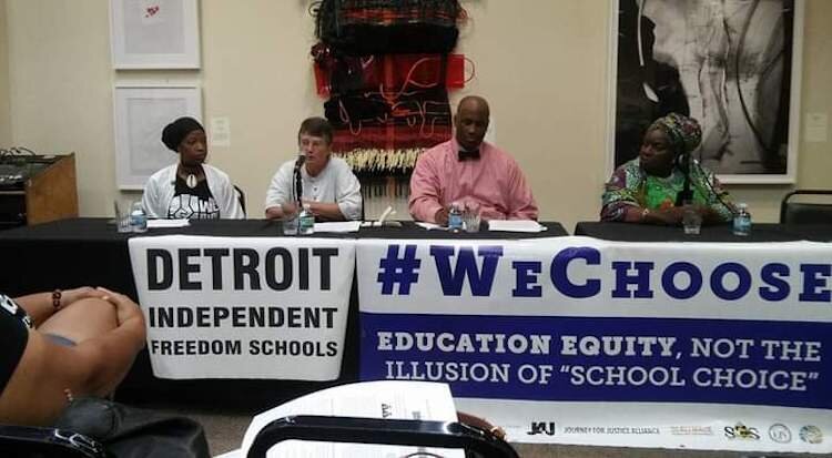 Michigan We Choose members and community residents in Benton Harbor shown at a meeting to discuss the proposed closure of Benton Harbor High School.