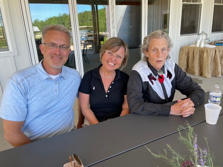 Temple Grandin sits with Krista Mason, the founder and executive director of Benjamin's Hope in Holland. (Courtesy)