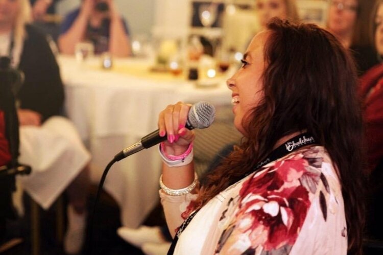 Stephanie Deibel speaks to a group.