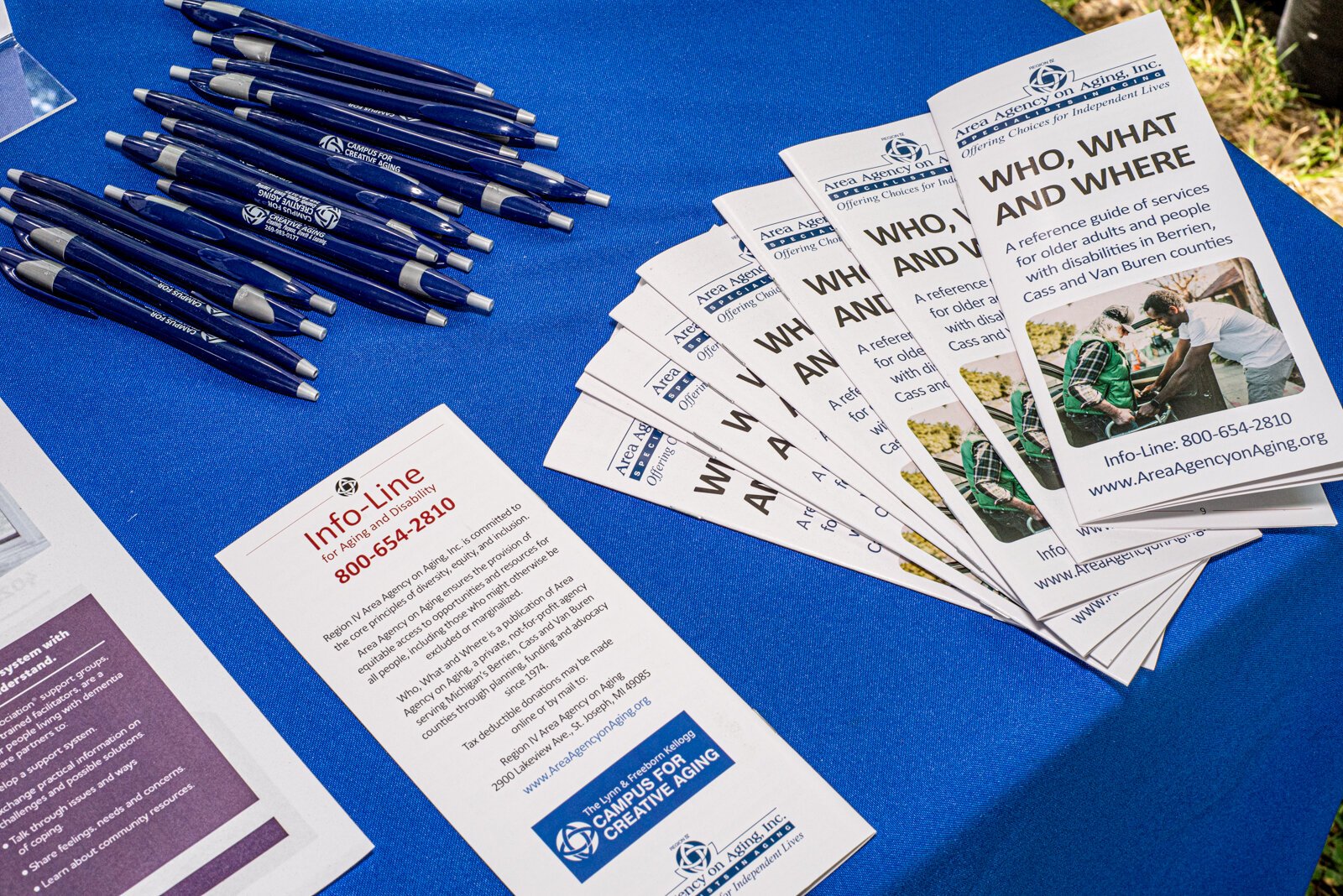 Literature and information for visitors to the Campus on Creative Aging's booth at the South Haven Art Fair.