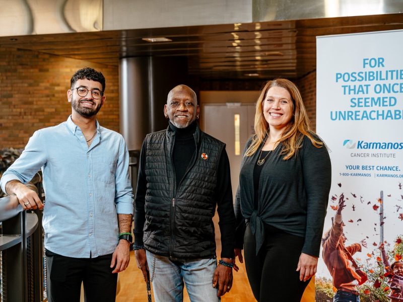 Dr. Theresa Hastert (right) helped develop the Michigan Community Outreach to Address Financial Toxicity (MI-COST). Ali Fakih (left) is a research assistant with MI-COST, and Cornelius Wilson (center) sits on its Community Advisory Board.