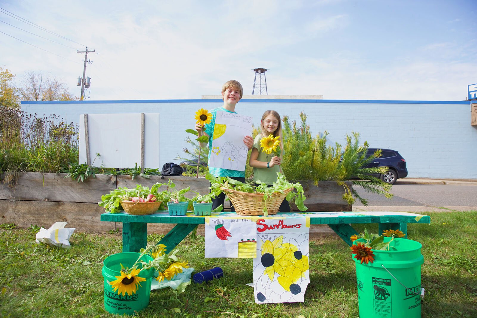 Students run a farm stand as part of Partridge Creek Farm's farm to school program in Ishpeming.