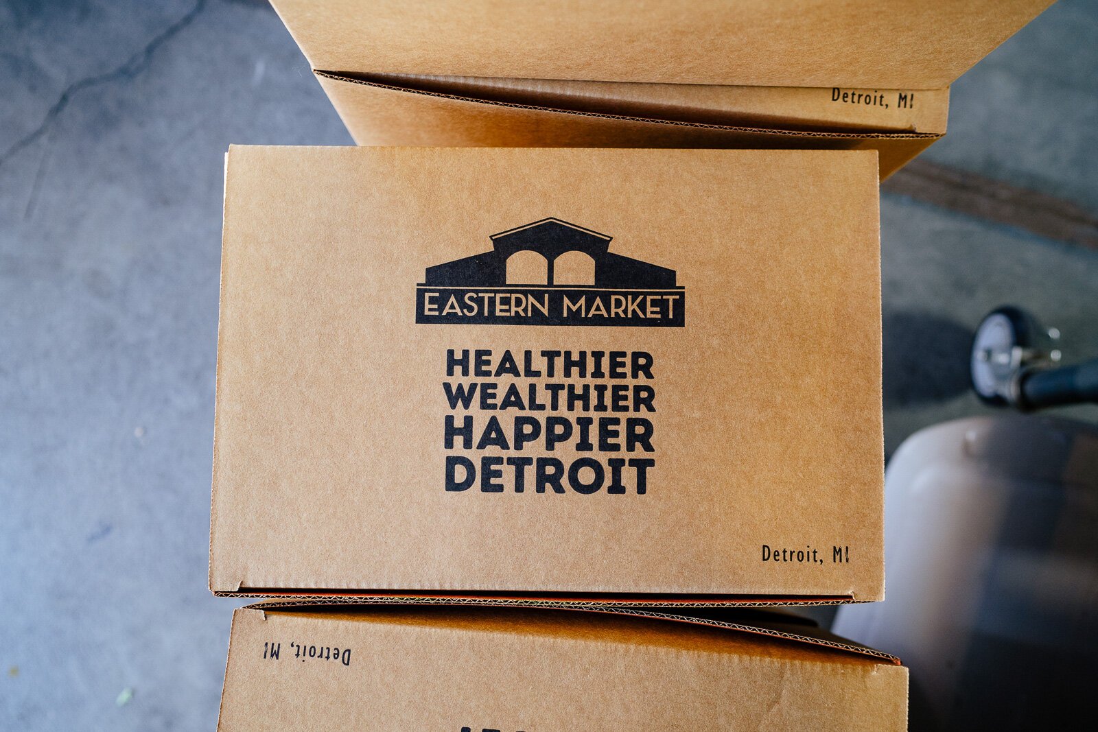 Food boxes, ordered online and prepared for pickup at Eastern Market.