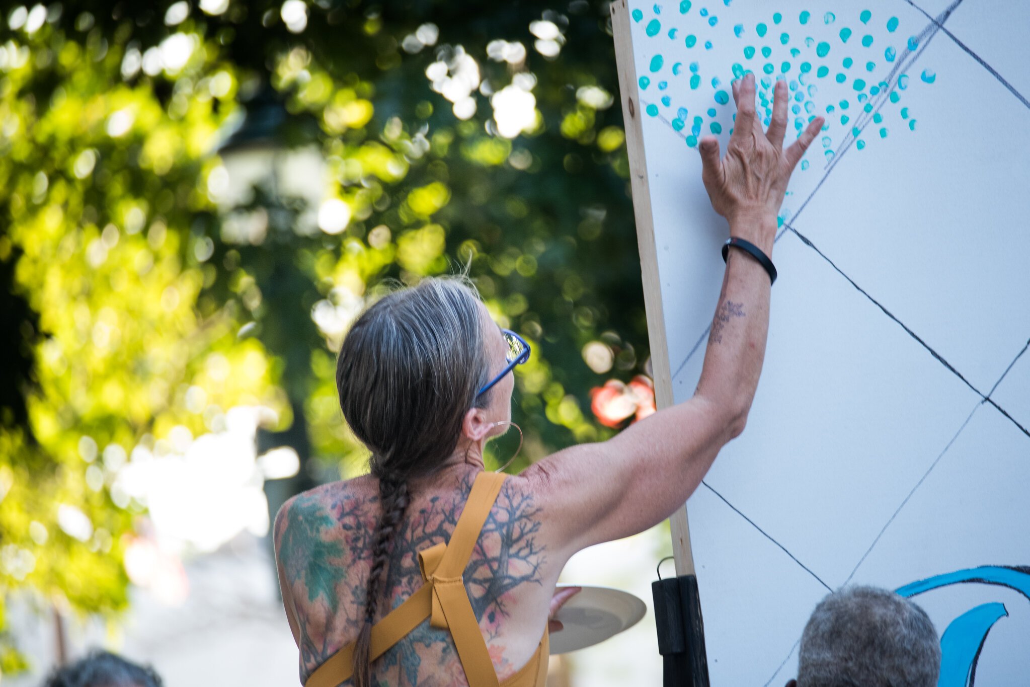 Attendees were invited to help paint the Brush the Block logo mural.
