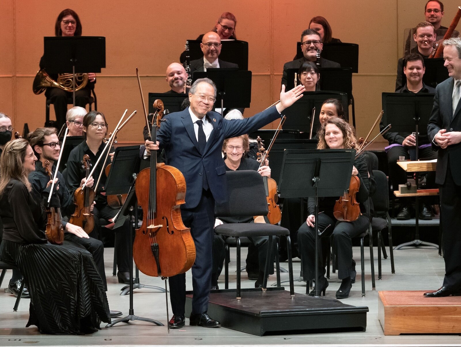 Yo-Yo Ma gestures to the crowd of the sold-out performance at Miller Auditorium.