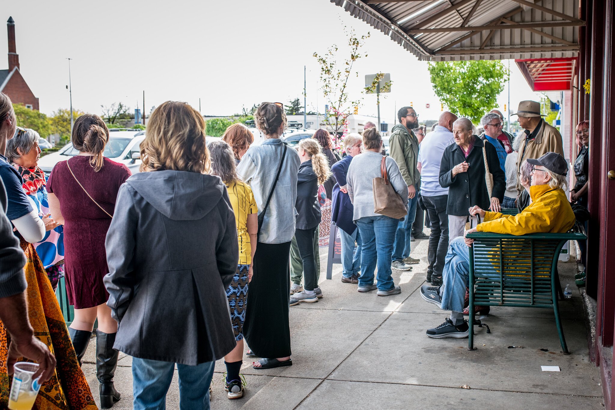 People lined up down the block to pay their respect to Dean Hauck at Michigan News Agency on Friday, May 2, 2025.