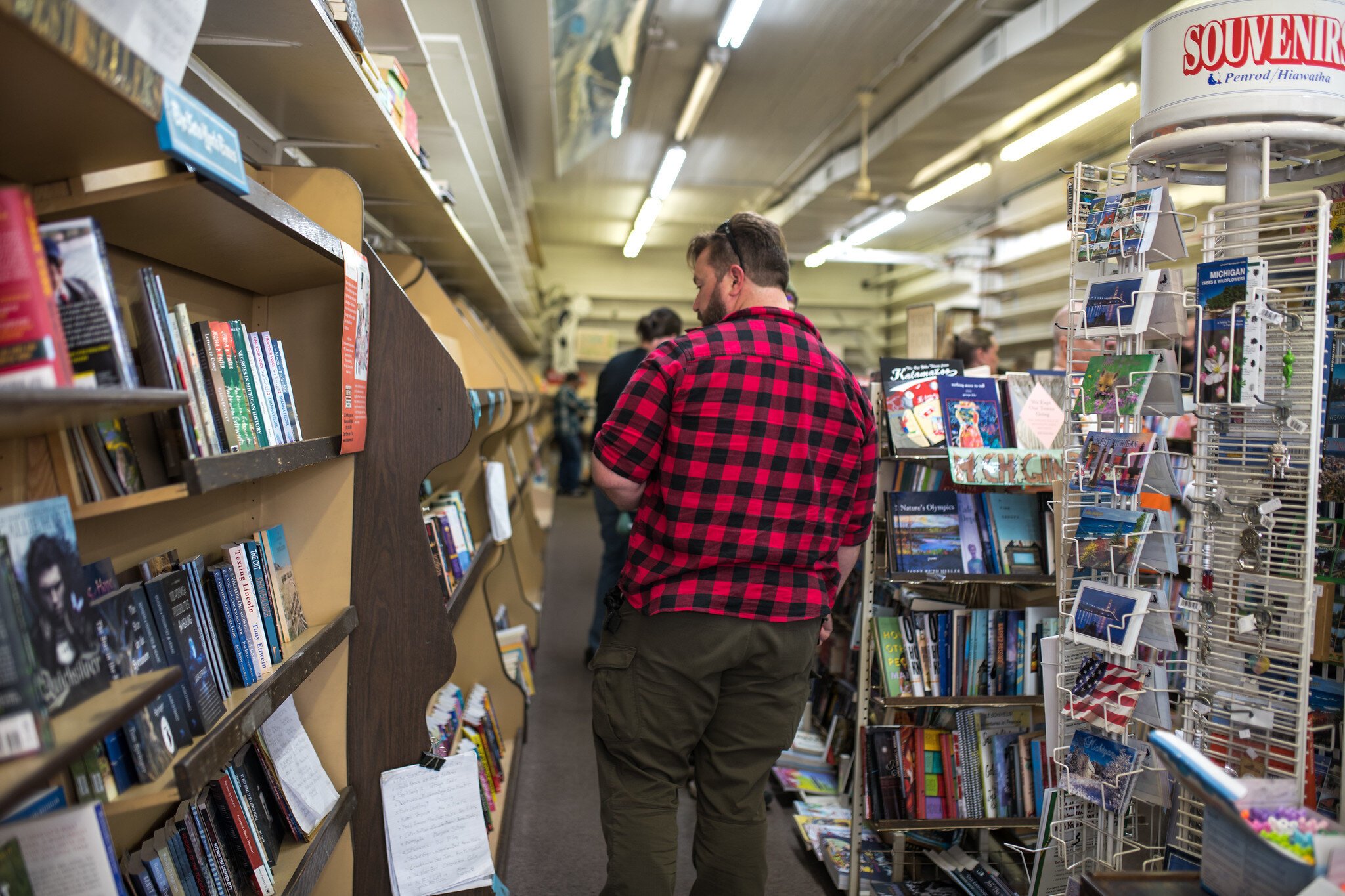 Many browsed through the stacks of books still remaining in the store.