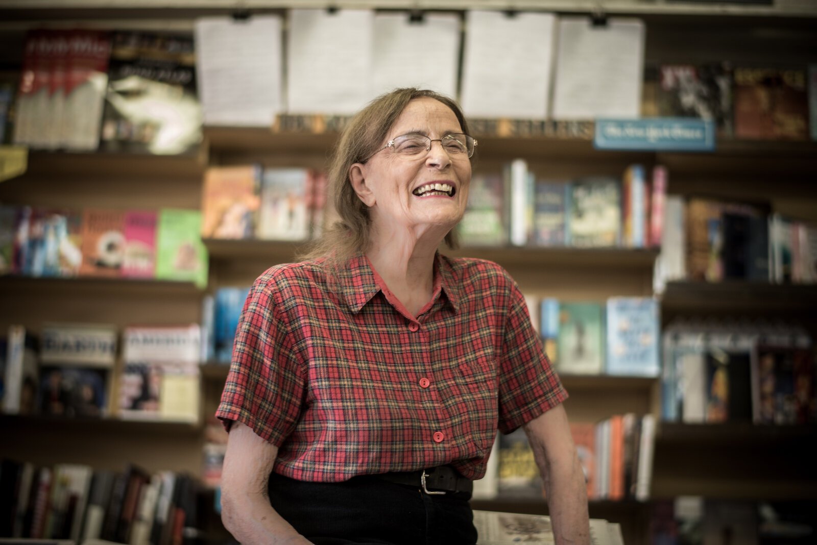 Michigan News’ owner, Dean Hauck, smiling at the counter.