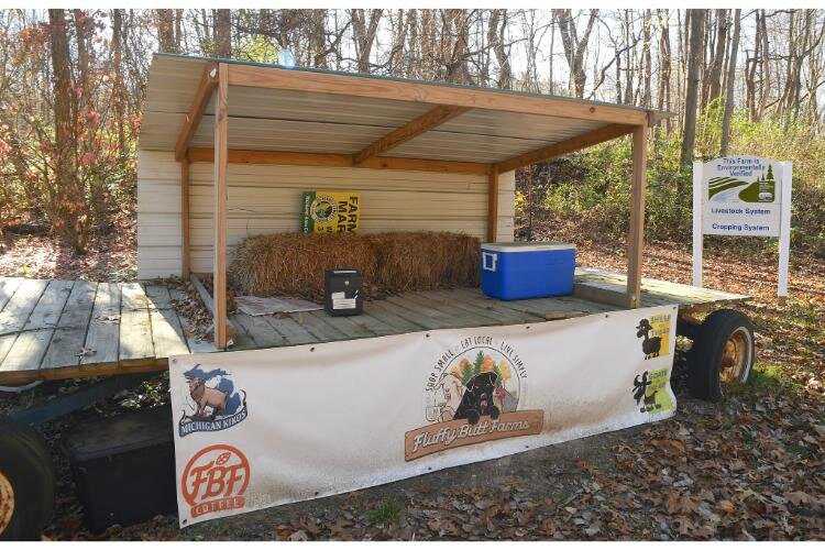 A stand near the entrance to Fluffy Butt Farms.