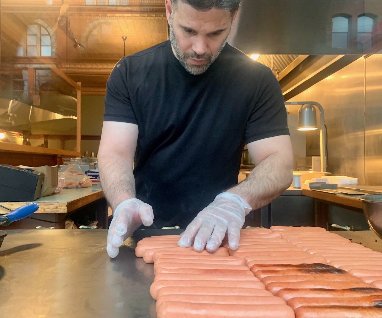 Mike Adams, co-owner of Coney Island Kalamazoo hot dog restaurant, says the conversion of the upper floors of its 266 E. Michigan Ave. building should not cause much of a disruption to his business.