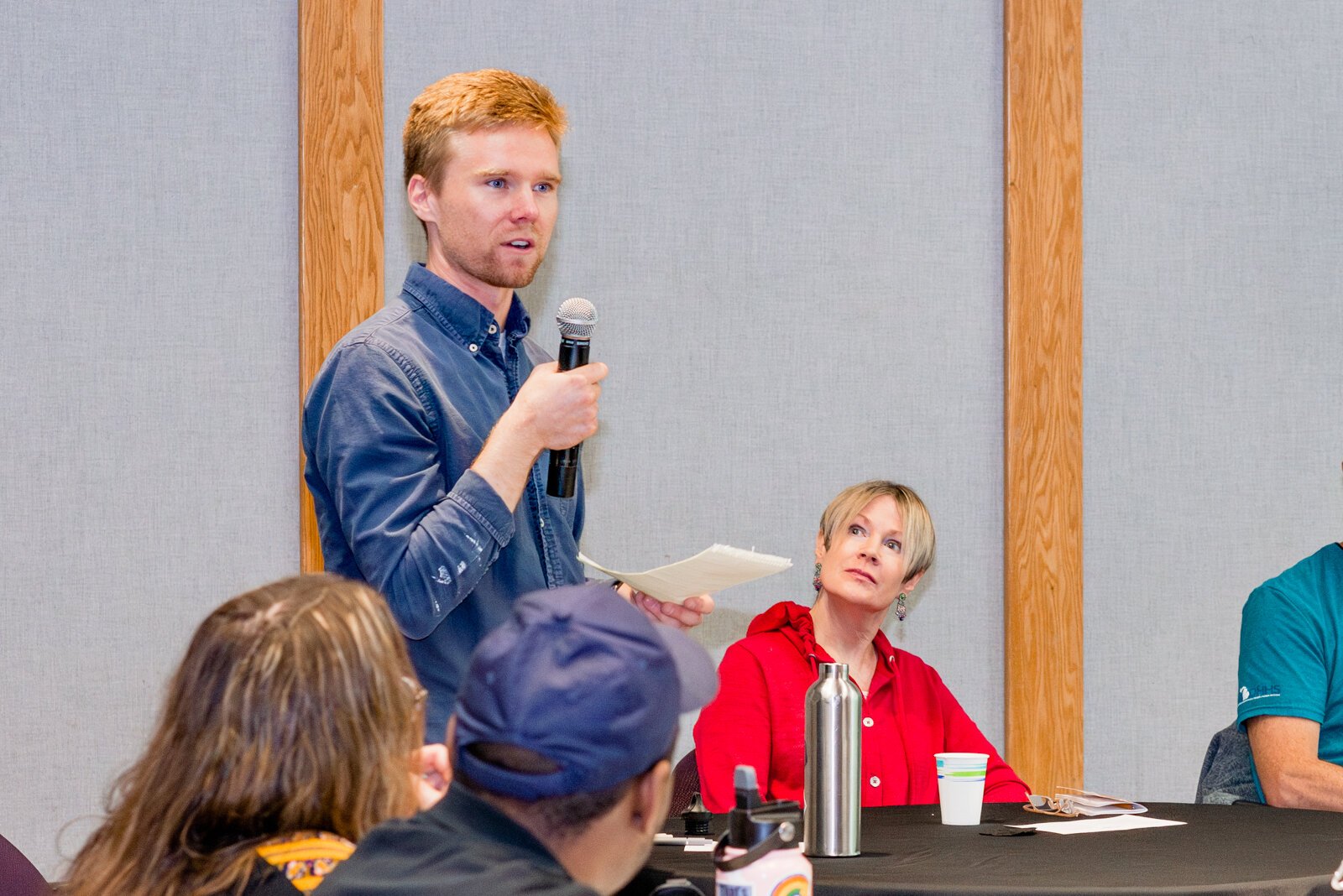 Matthew Miller, Lyceum founder, introduces the panel members.