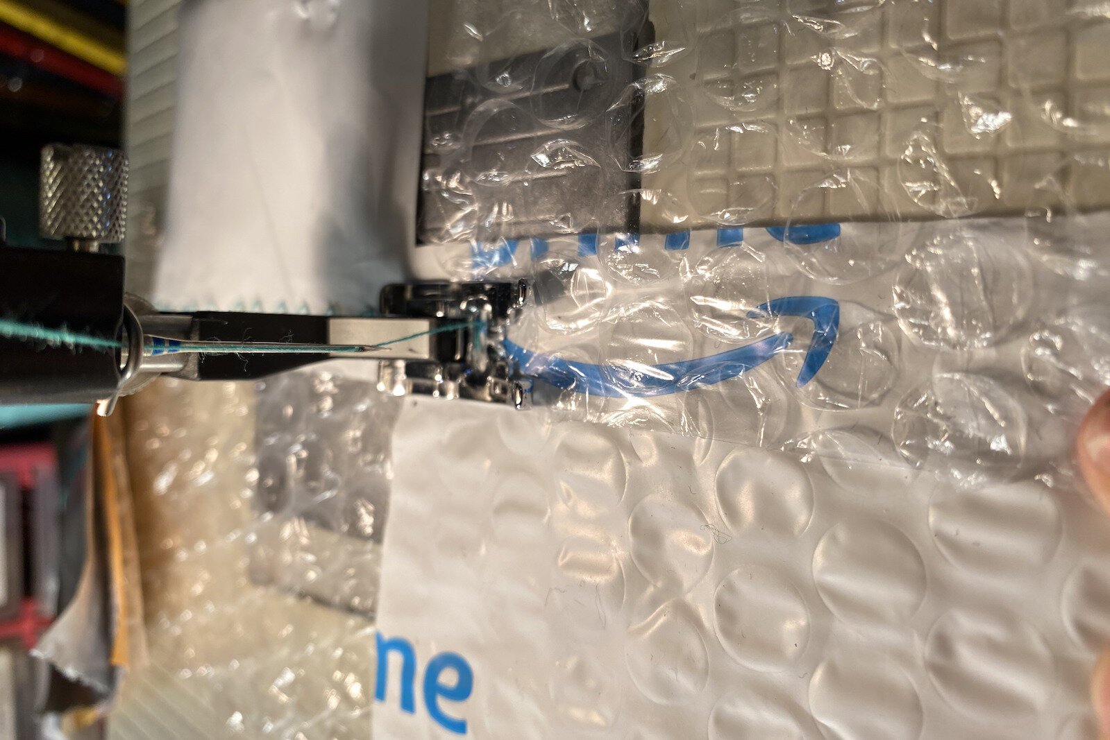 The squares were matched up according to size and sewn into strips on a sewing machine.