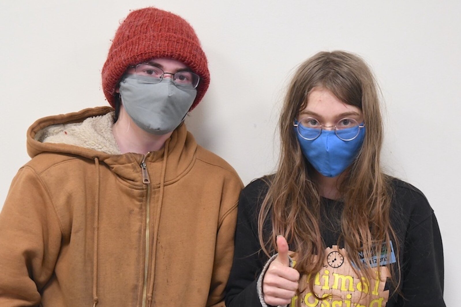 Logan, 17, (left) and Kai, 15 (right) are siblings who participated in Voices of Youth Battle Creek.