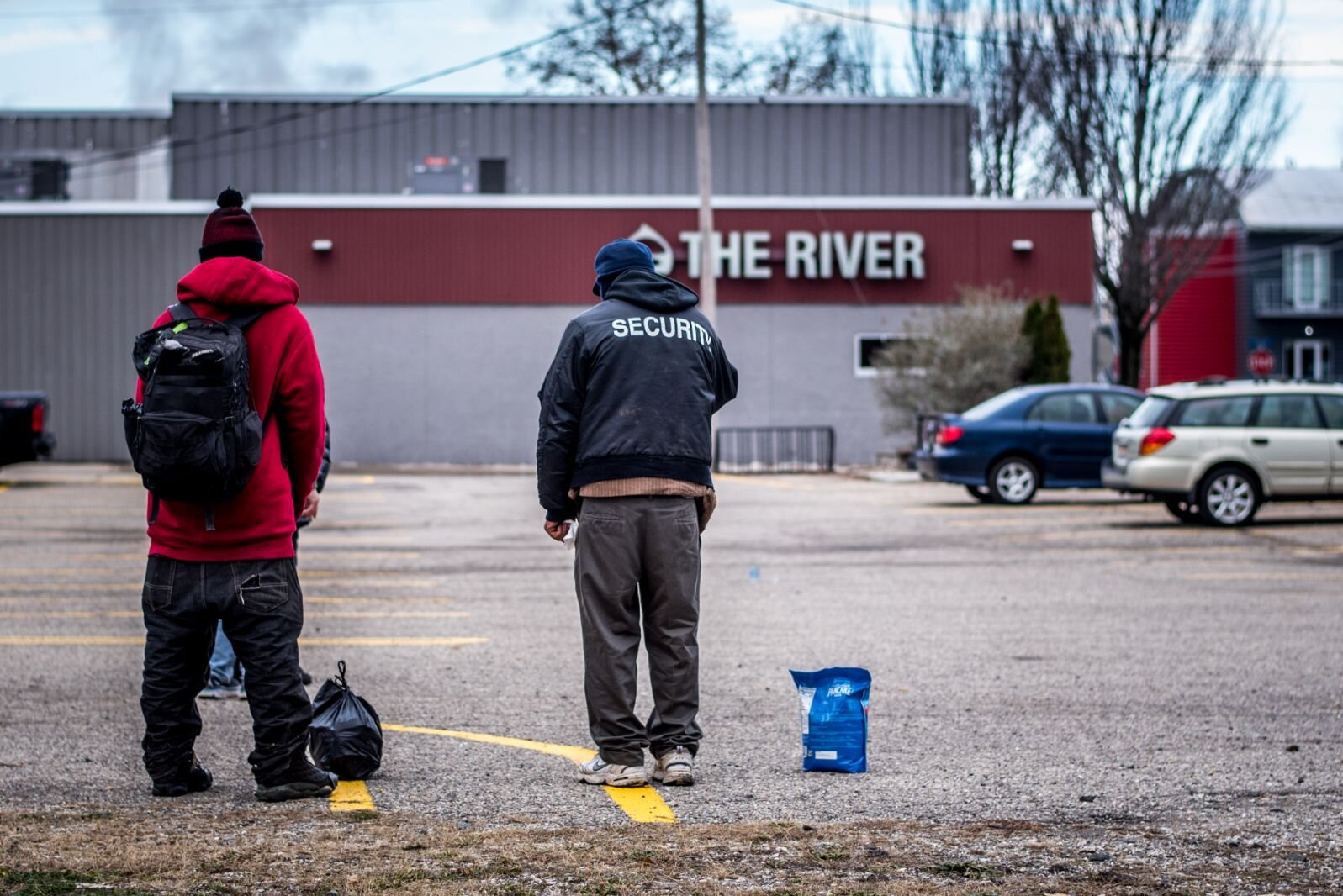 Plans between The River and Integrated Services of Kalamazoo to open a warming shelter fell through for the day. So Jan van Schaik made sure to stay at the parking lot to meet people who were expecting to get inside.
