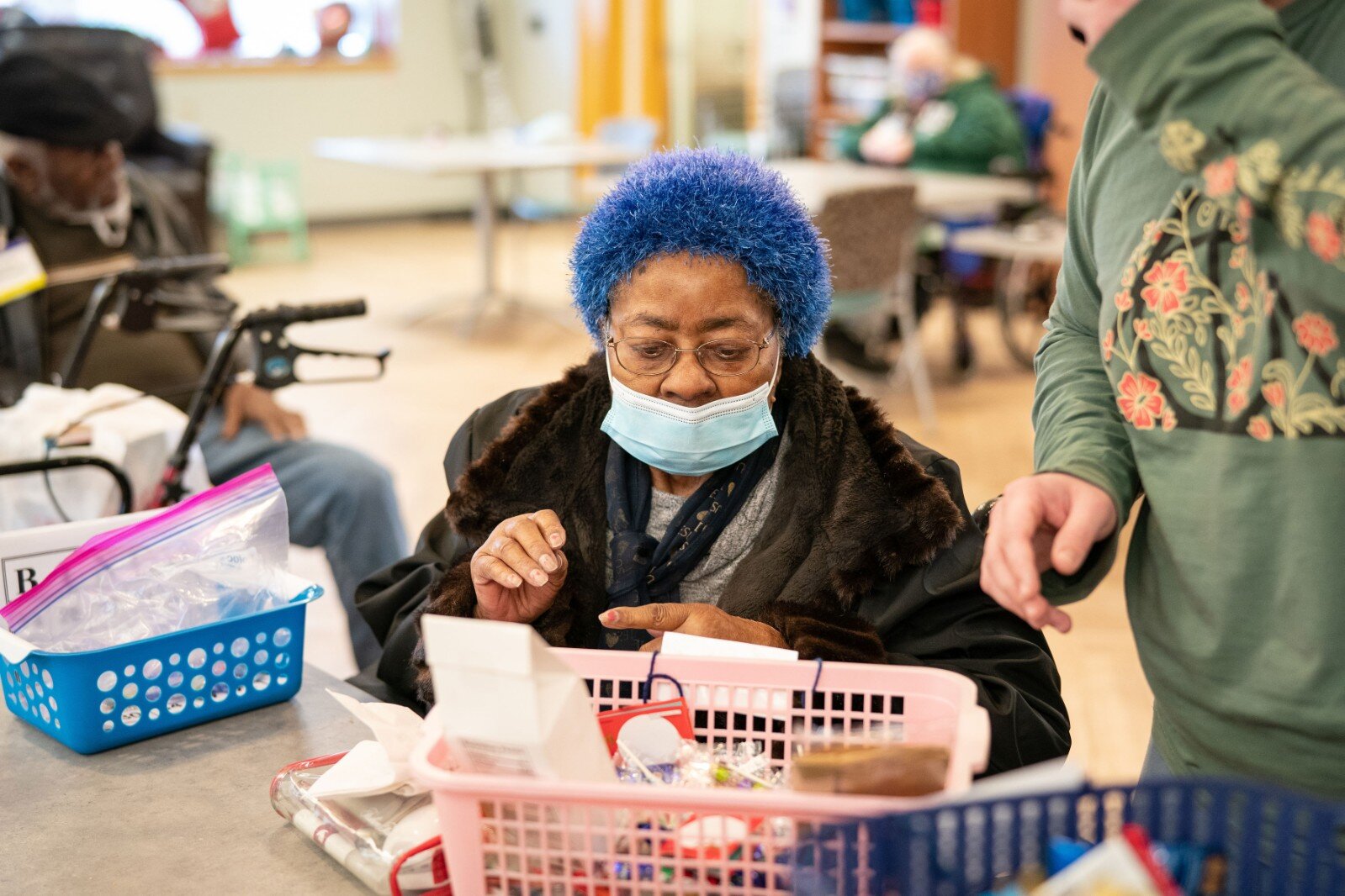 A participant works on an arts and crafts project.